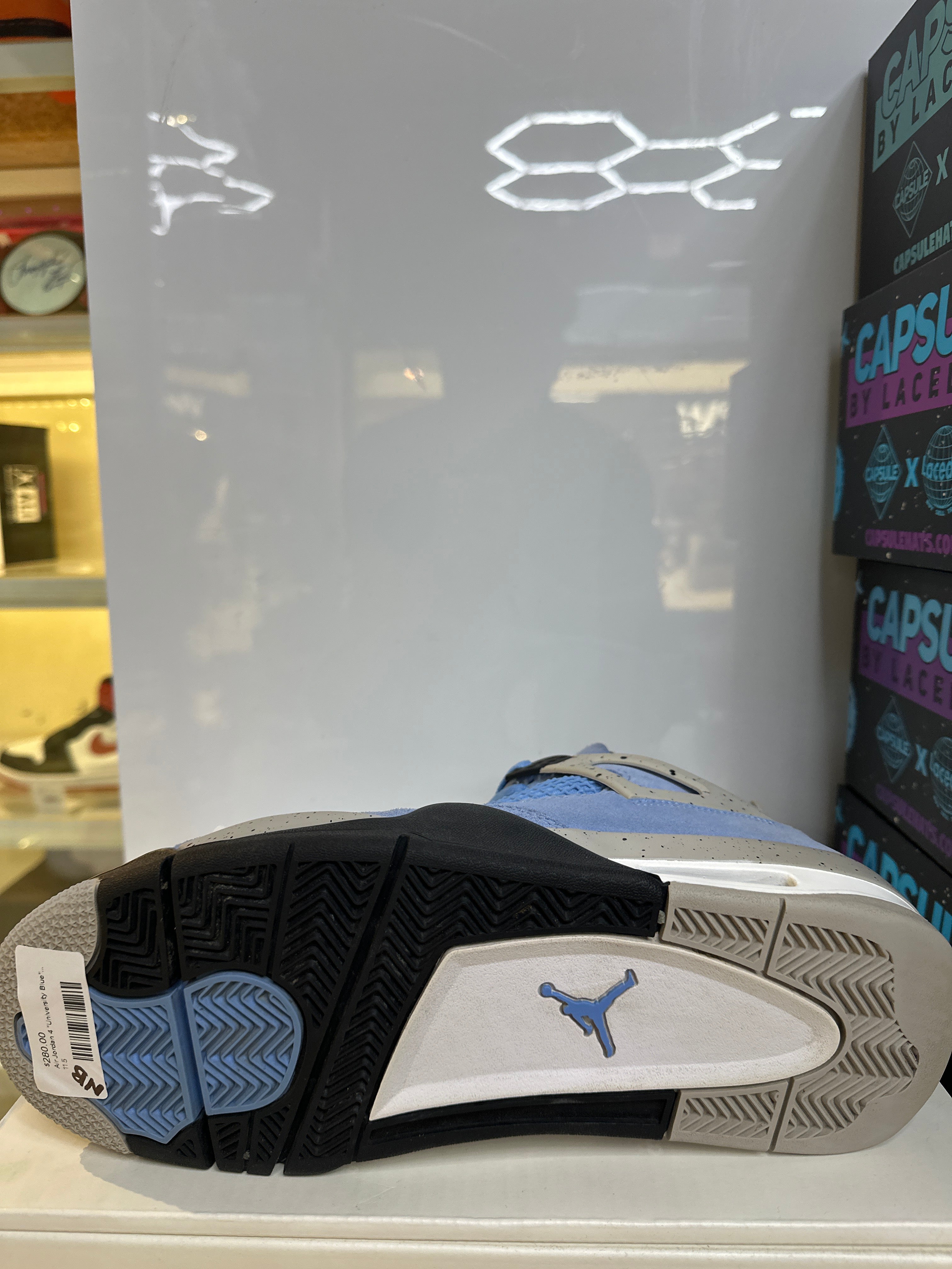 Air Jordan 4 "University Blue" (Pre-Owned)