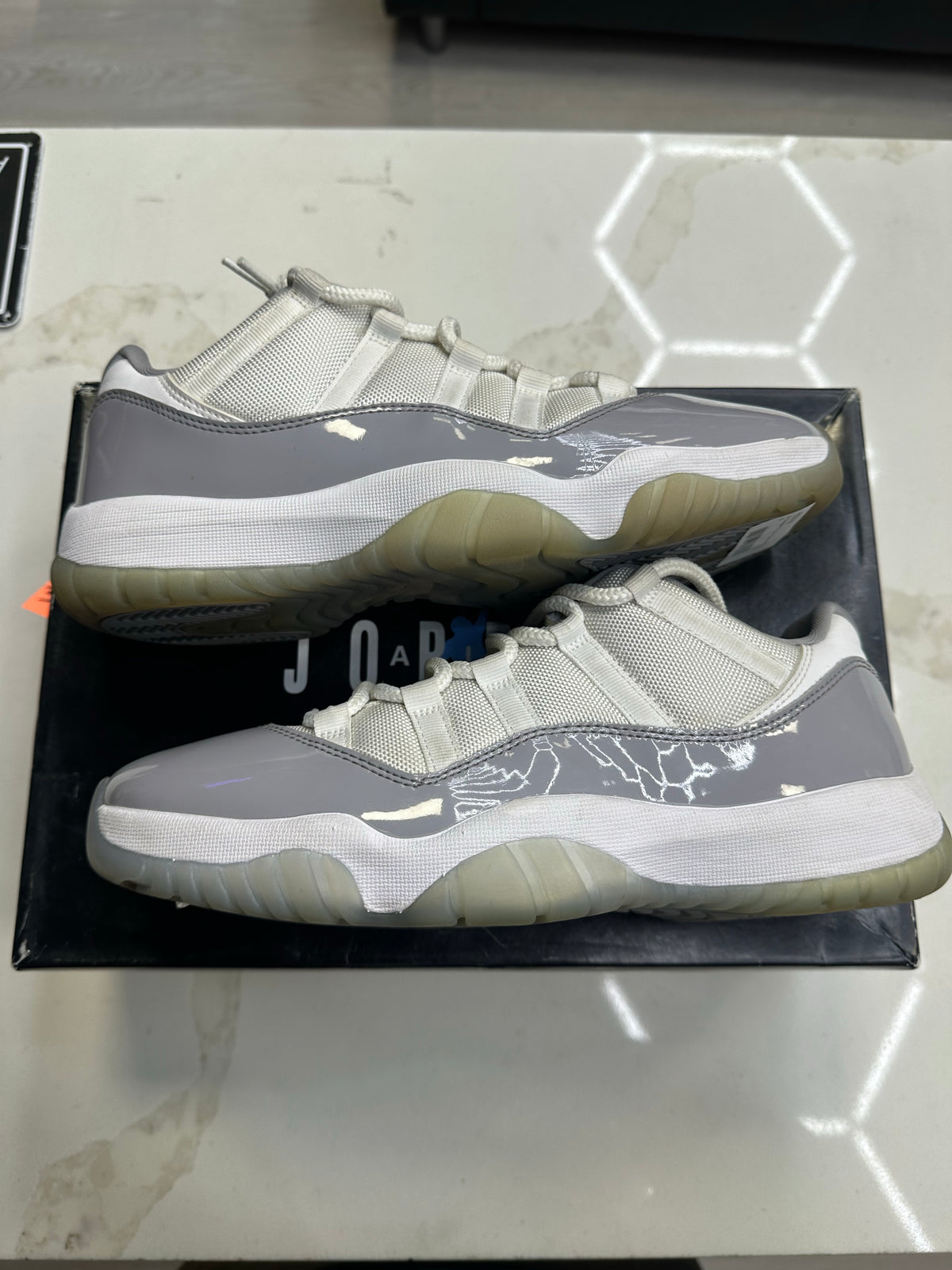 Jordan 11 Retro Low Cement Grey