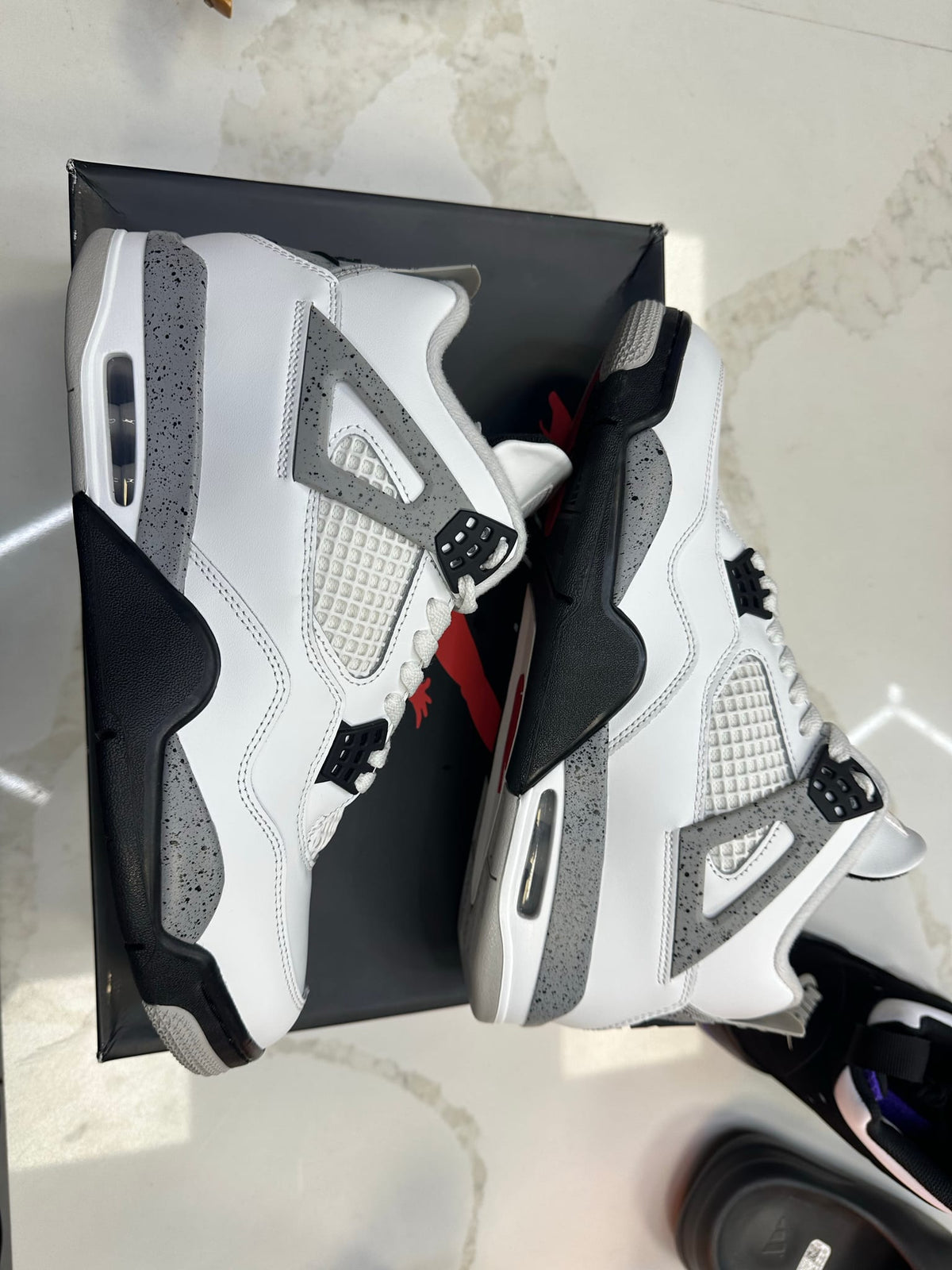 Jordan 4 Retro White Cement (2025)