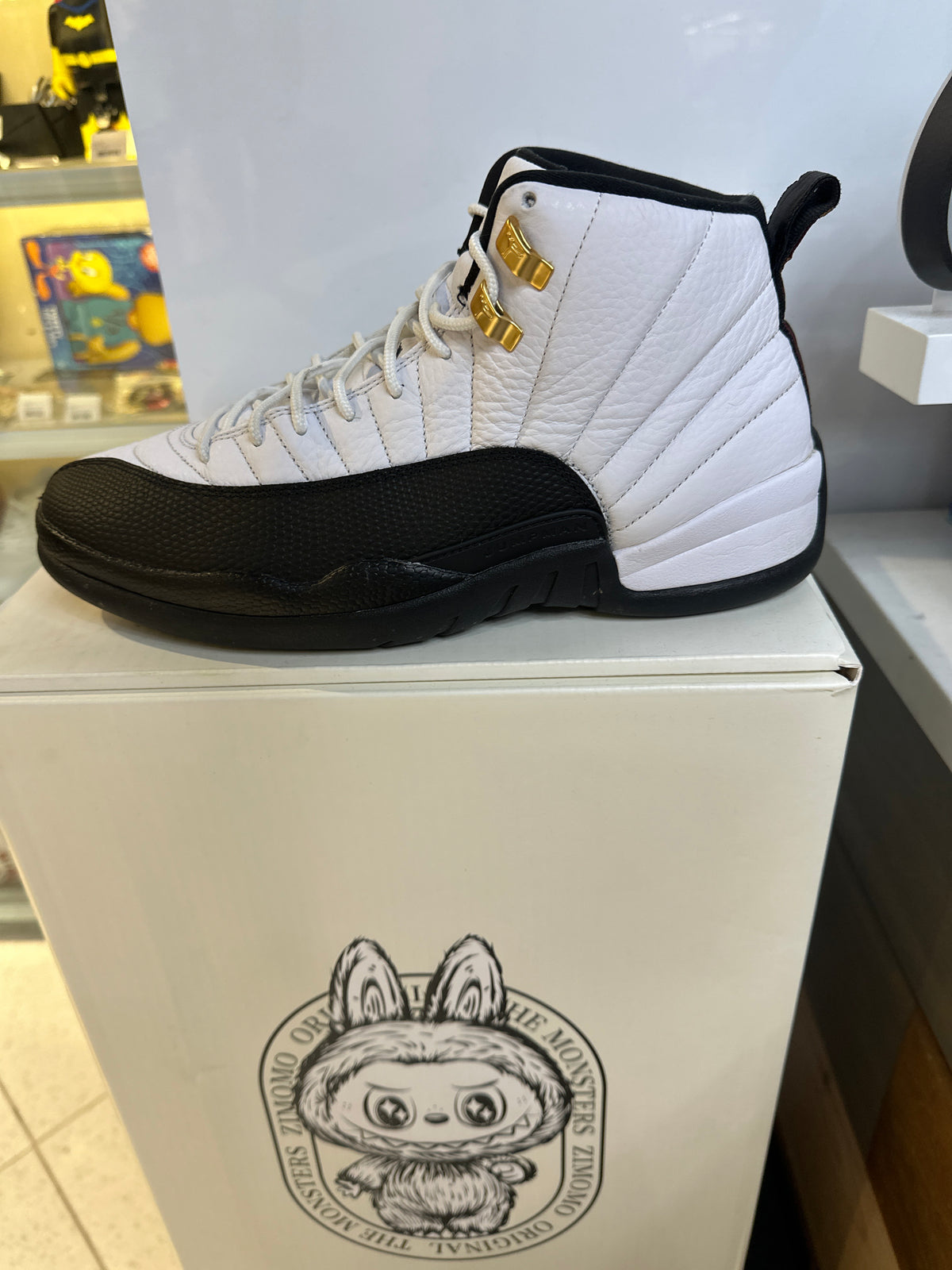 Air Jordan 12 "Taxi" (pre-owned)