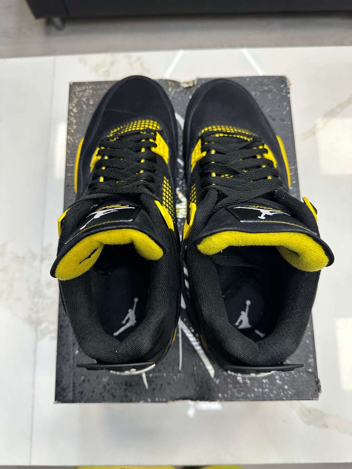 Jordan 4 Retro Thunder (2023)