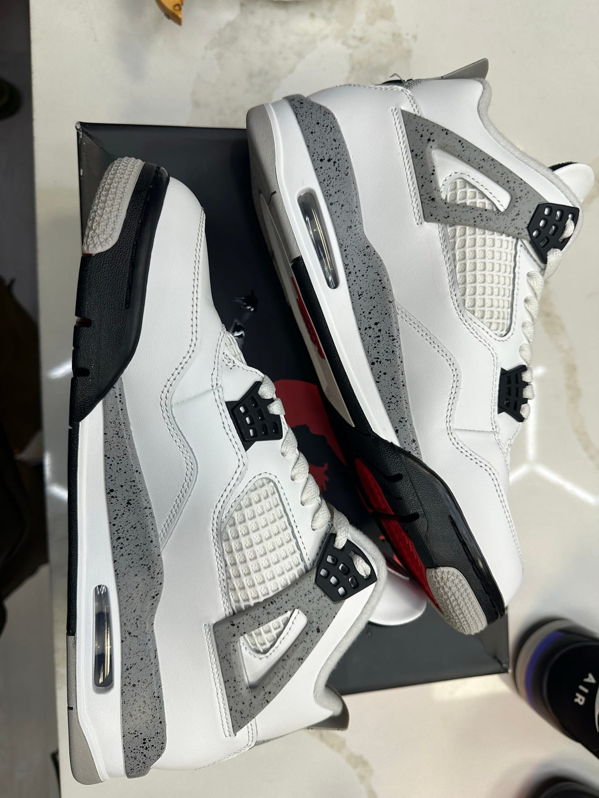 Jordan 4 Retro White Cement (2025)