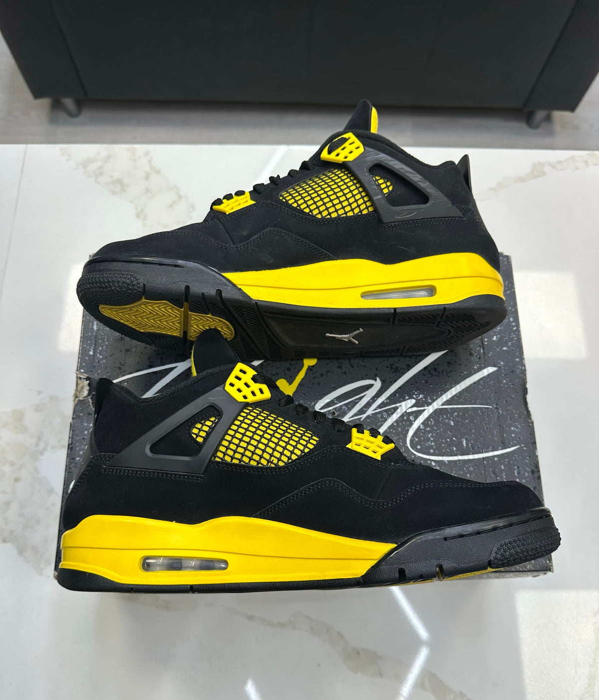 Jordan 4 Retro Thunder (2023)