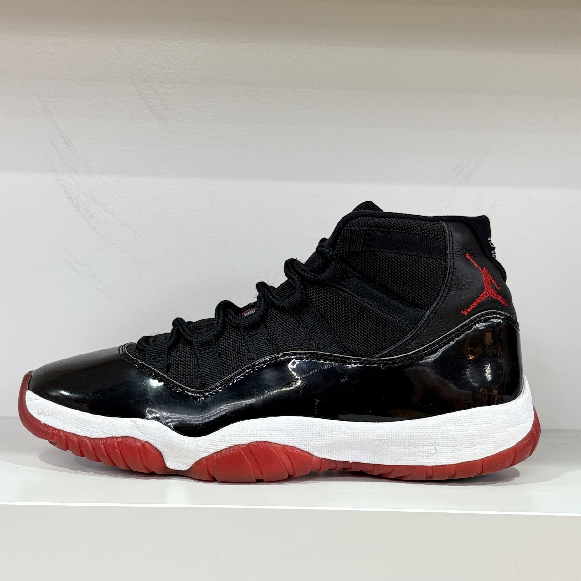 Air Jordan 11 "Playoffs Bred" (pre-owned)